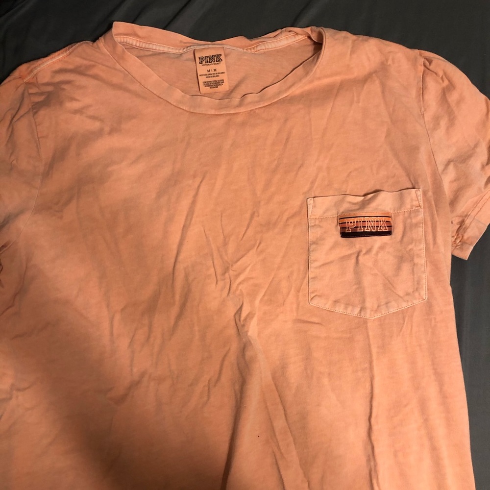 salmon pink shirt!